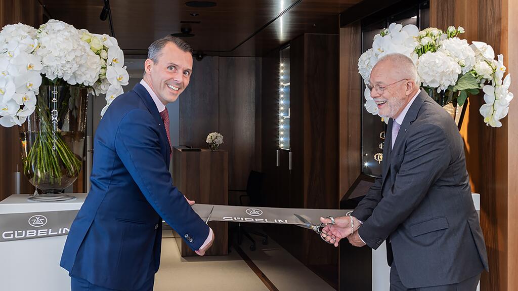 House of Gübelin President Raphael Gübelin (left) and his predecessor, his father Thomas Gübelin (right), cut the ribbon at the opening of the Gübelin Gem Museum. Raphael Gübelin and Thomas Gübelin at Gübelin Gem Museum ribbon cutting